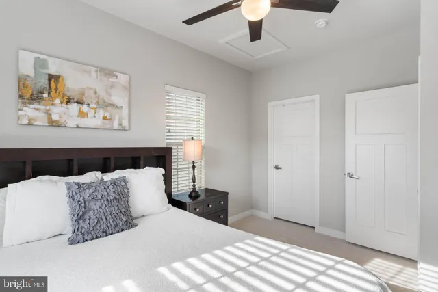 a bathroom with a bathtub and a window