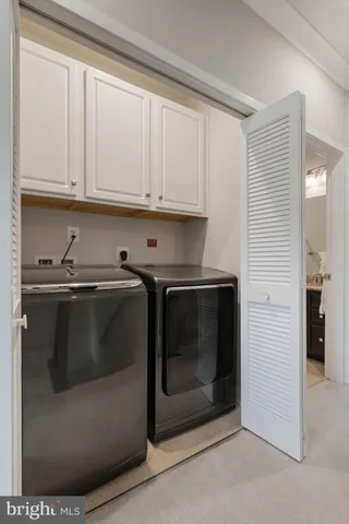 a view of a house with a sink and cabinets