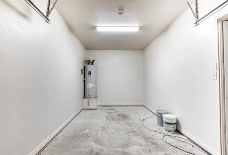 a view of room with stairs and a potted plant