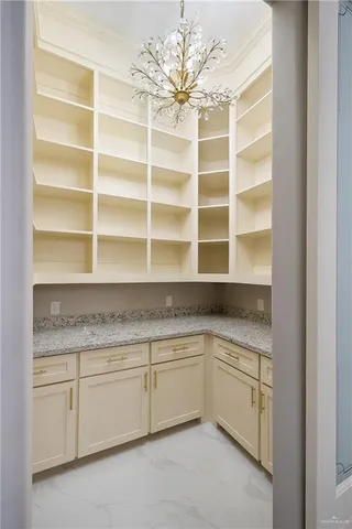 a cabinets with a sink and a mirror