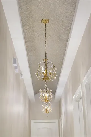 a view of a chandelier in a room