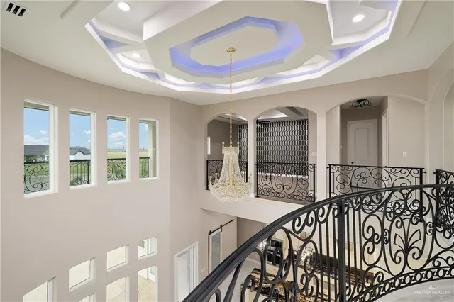 a view of a kitchen with a sink and cabinets