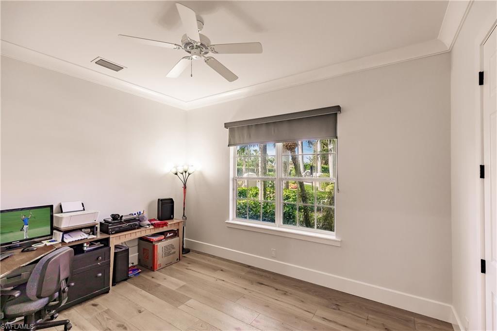 20199 Markward Crossing Estero, FL 33928 - Photo 31 of 45 a view of a workspace with furniture and a window