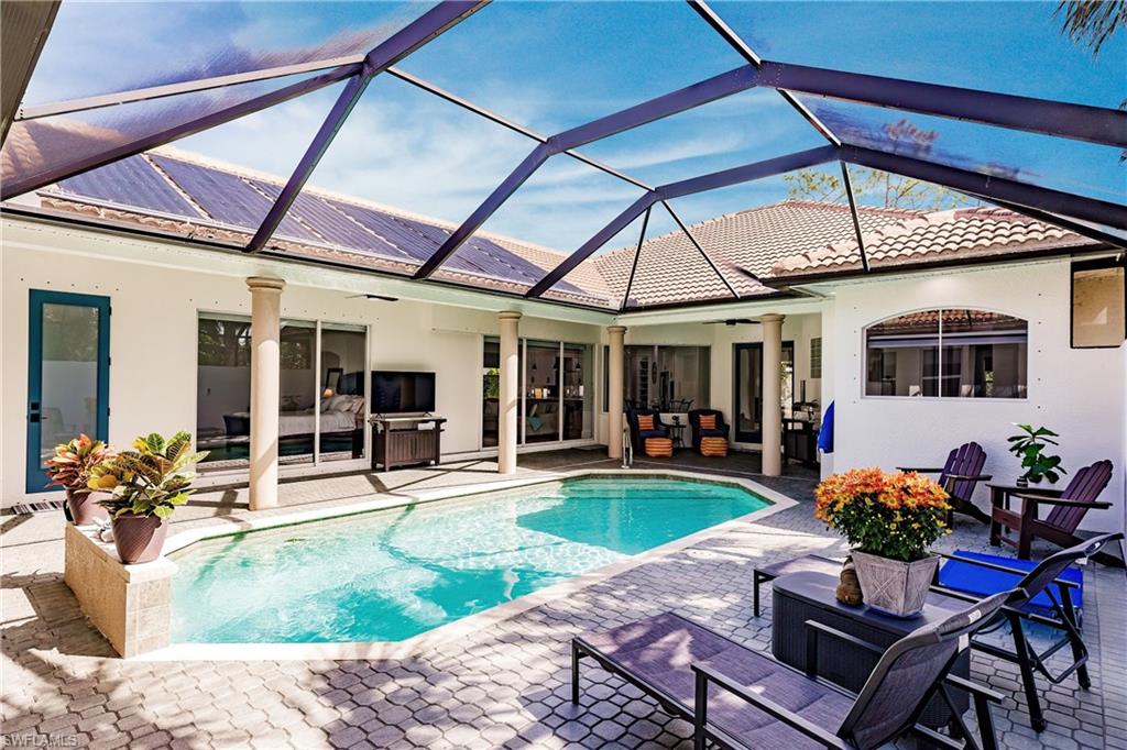 20199 Markward Crossing Estero, FL 33928 - Photo 33 of 45 a front view of house with outdoor seating