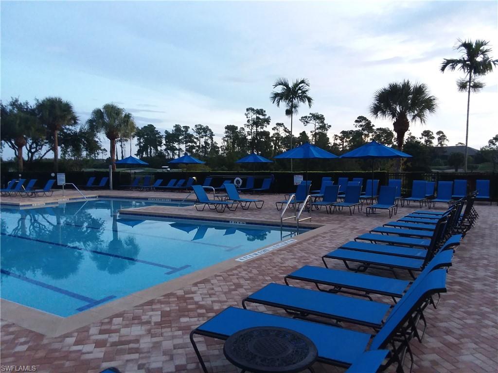 20199 Markward Crossing Estero, FL 33928 - Photo 44 of 45 a view of a chairs and table on the wooden floor
