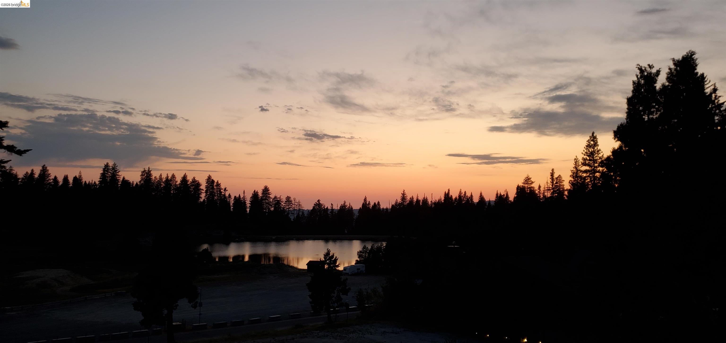33757 Upper Leland Road, Unit B Pinecrest, CA 95364 - Photo 32 of 39 a view of a lake in middle of the house