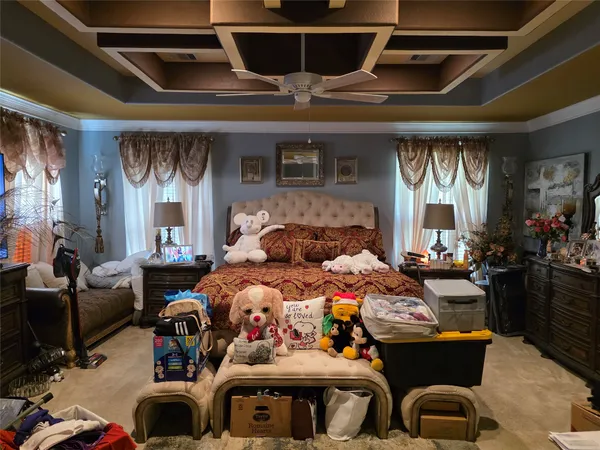 a bed room with furniture and a window