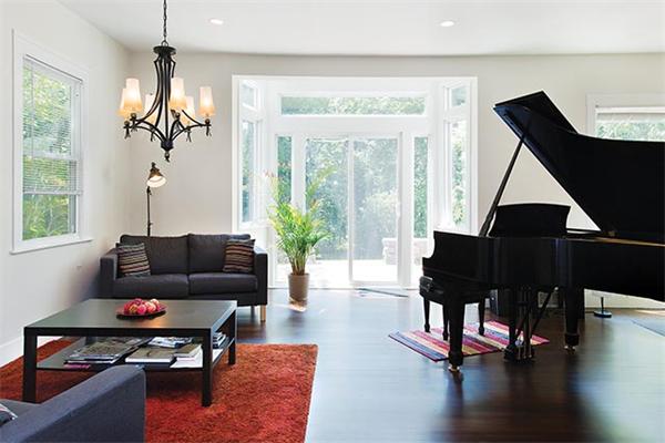a living room with furniture dining table and a window