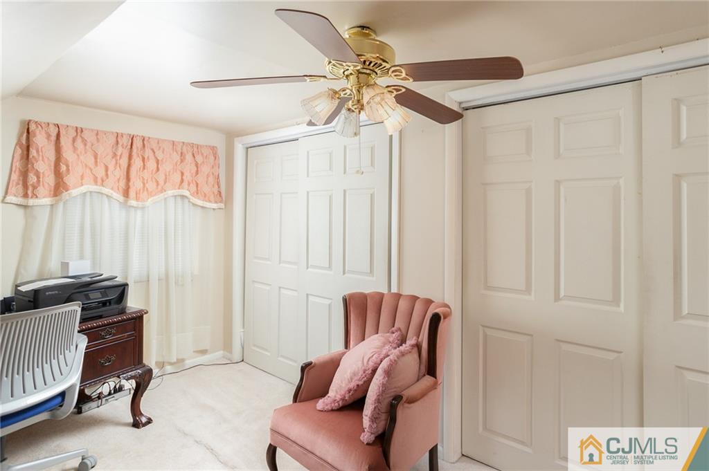 460 Warfield Road North Plainfield, NJ 07060 - Photo 16 of 29 a living room with furniture and a window