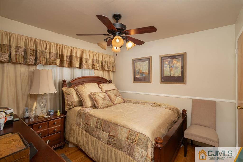 460 Warfield Road North Plainfield, NJ 07060 - Photo 17 of 29 a bedroom with a bed and window