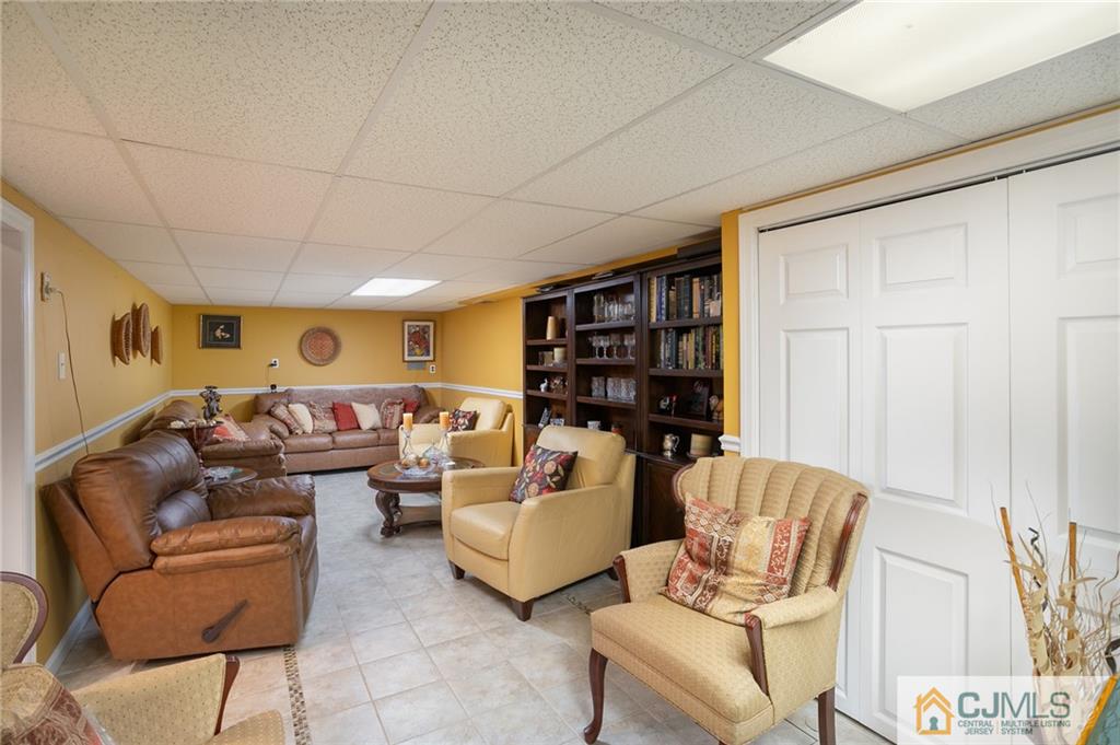 460 Warfield Road North Plainfield, NJ 07060 - Photo 20 of 29 a living room with furniture cabinets and window