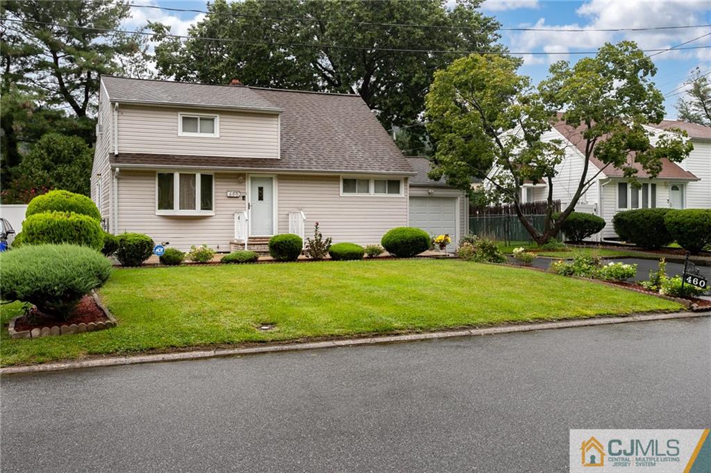 460 Warfield Road North Plainfield, NJ 07060 - Photo 2 of 29 a front view of a house with a yard and trees