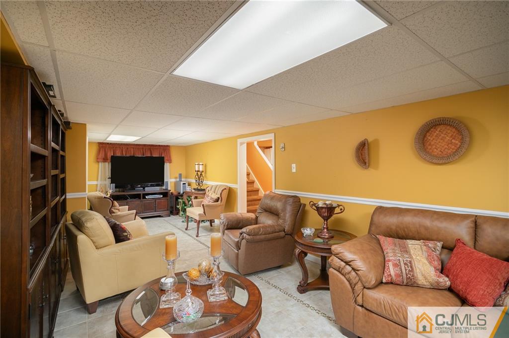 460 Warfield Road North Plainfield, NJ 07060 - Photo 21 of 29 a living room with furniture and a flat screen tv