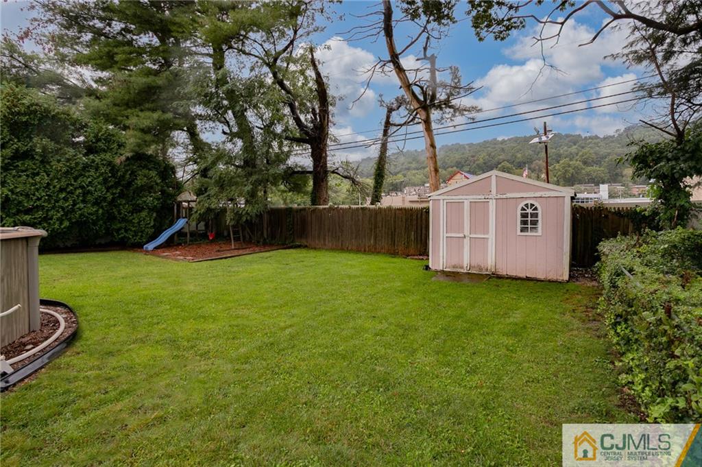 460 Warfield Road North Plainfield, NJ 07060 - Photo 29 of 29 a view of a backyard with barn and garden