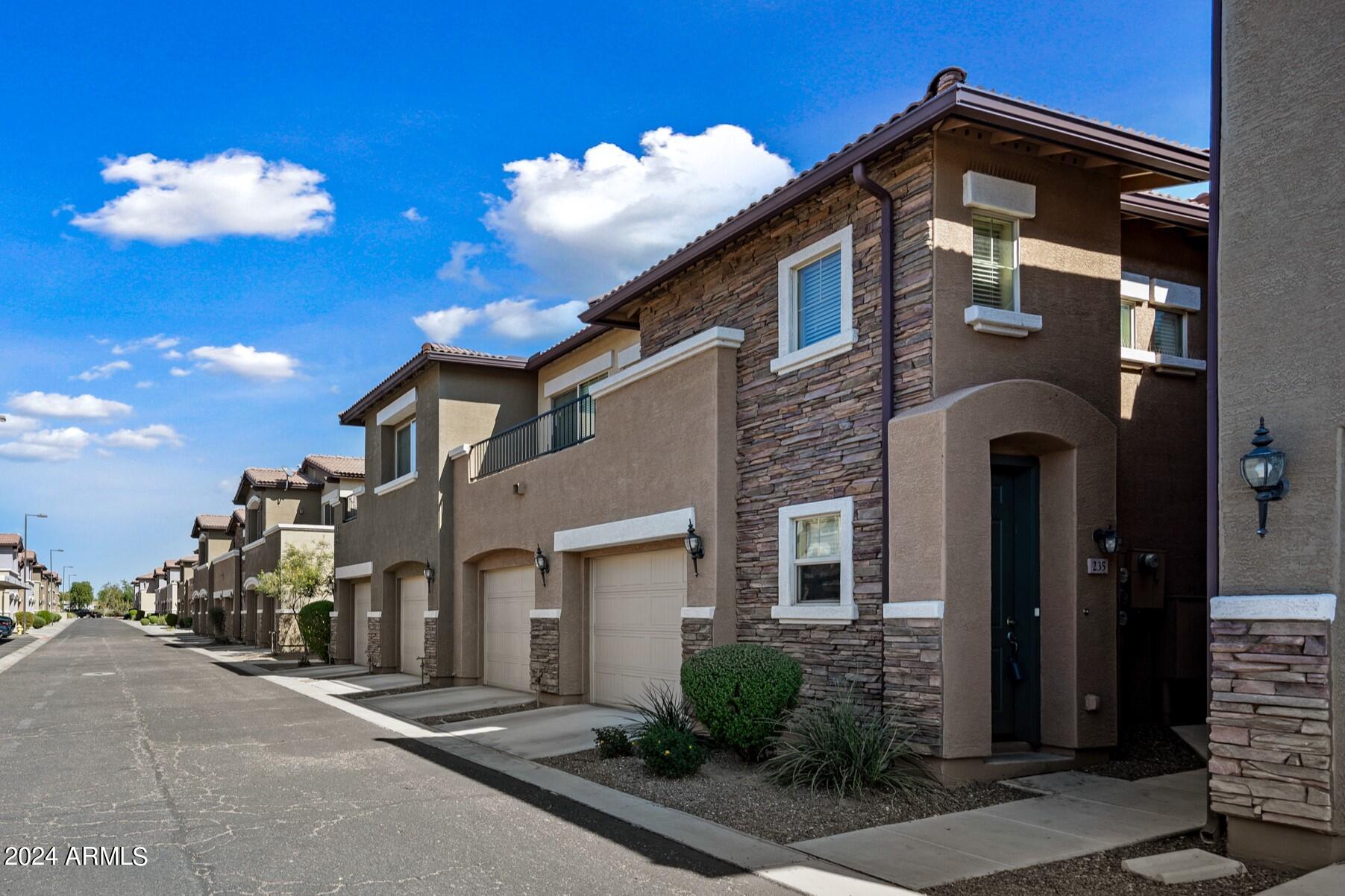 7726 East Baseline Road, Unit 235 Mesa, AZ 85209 - Photo 1 of 31 front view of a house with a street