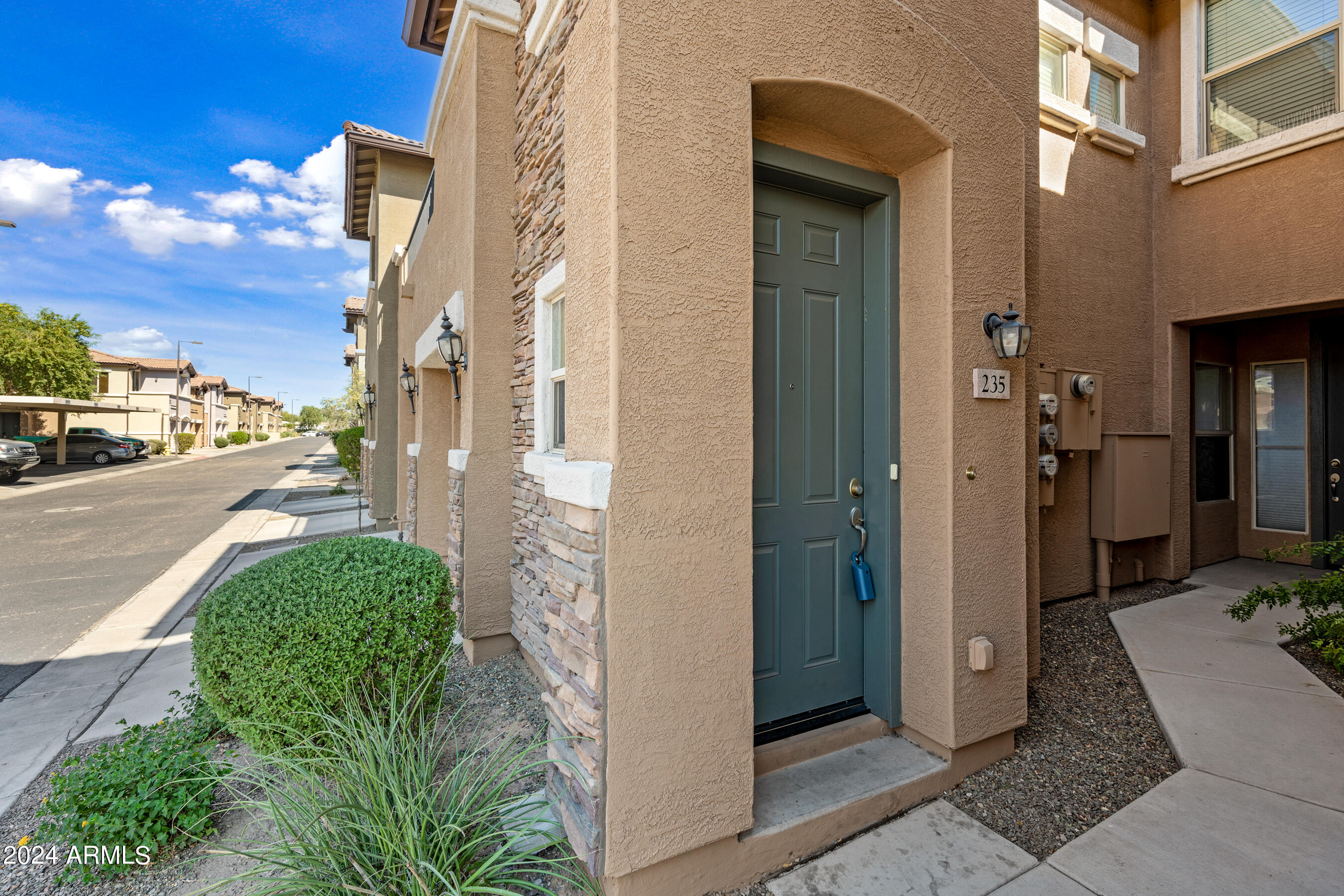 7726 East Baseline Road, Unit 235 Mesa, AZ 85209 - Photo 2 of 31 a view of a street from a building