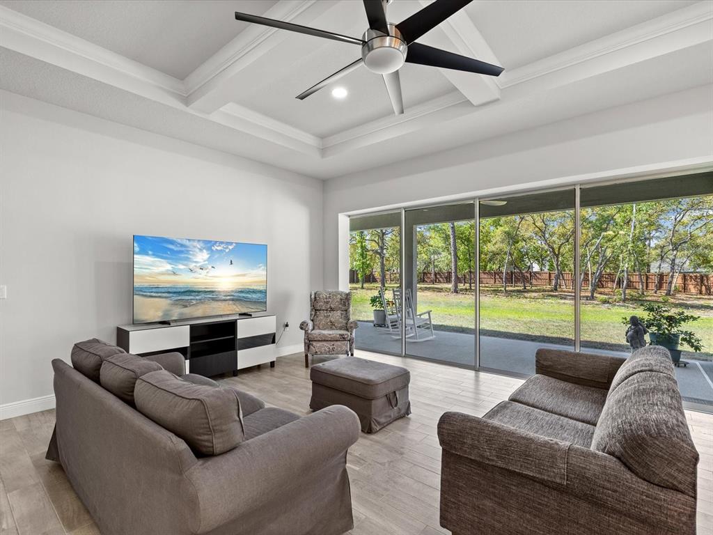 11981 Robina Road Weeki Wachee, FL 34614 - Photo 8 of 93 a living room with furniture and a large window
