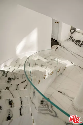 a view of a dining room with furniture window and garden view