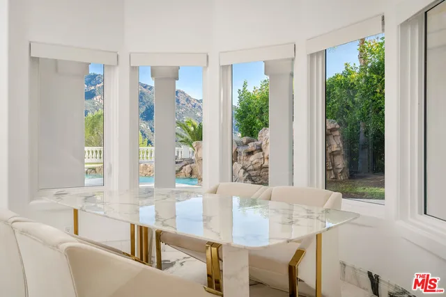 a kitchen with granite countertop a sink and a window