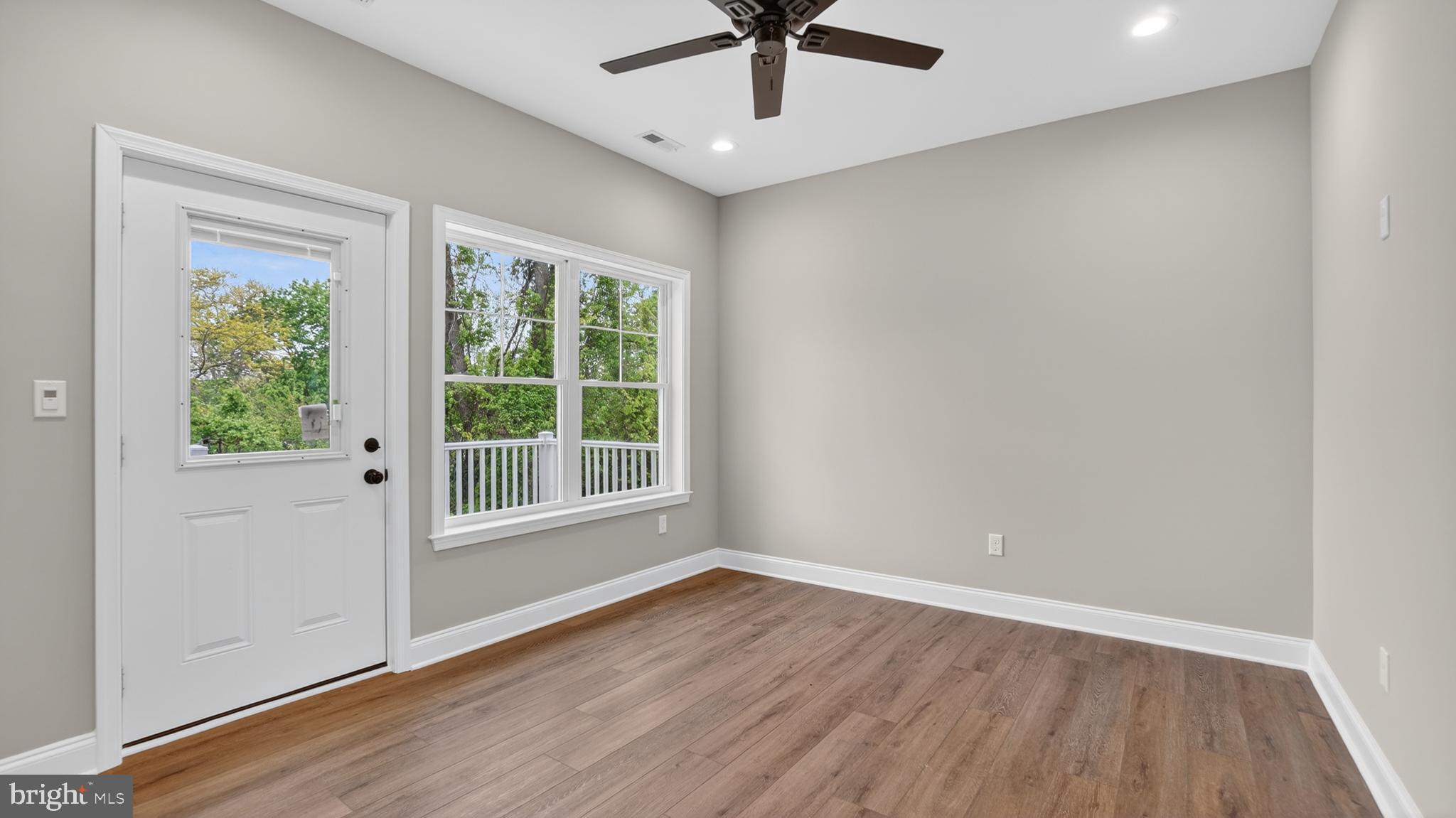 2001 Poplar Ridge Road Pasadena, MD 21122 - Photo 46 of 83 wooden floor in an empty room with a window