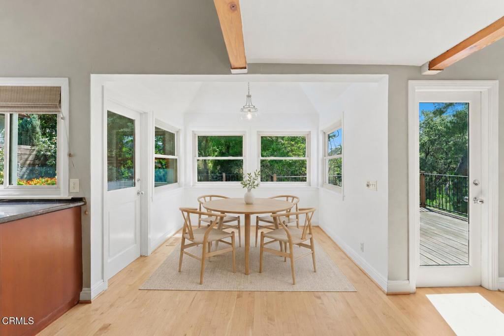 405 Woodcliffe Road Pasadena, CA 91105 - Photo 18 of 65 a dining room with furniture and window