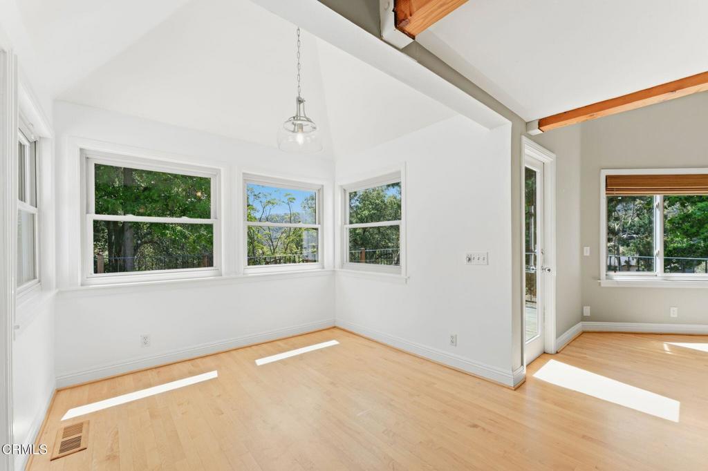 405 Woodcliffe Road Pasadena, CA 91105 - Photo 21 of 65 a view of an empty room with a window