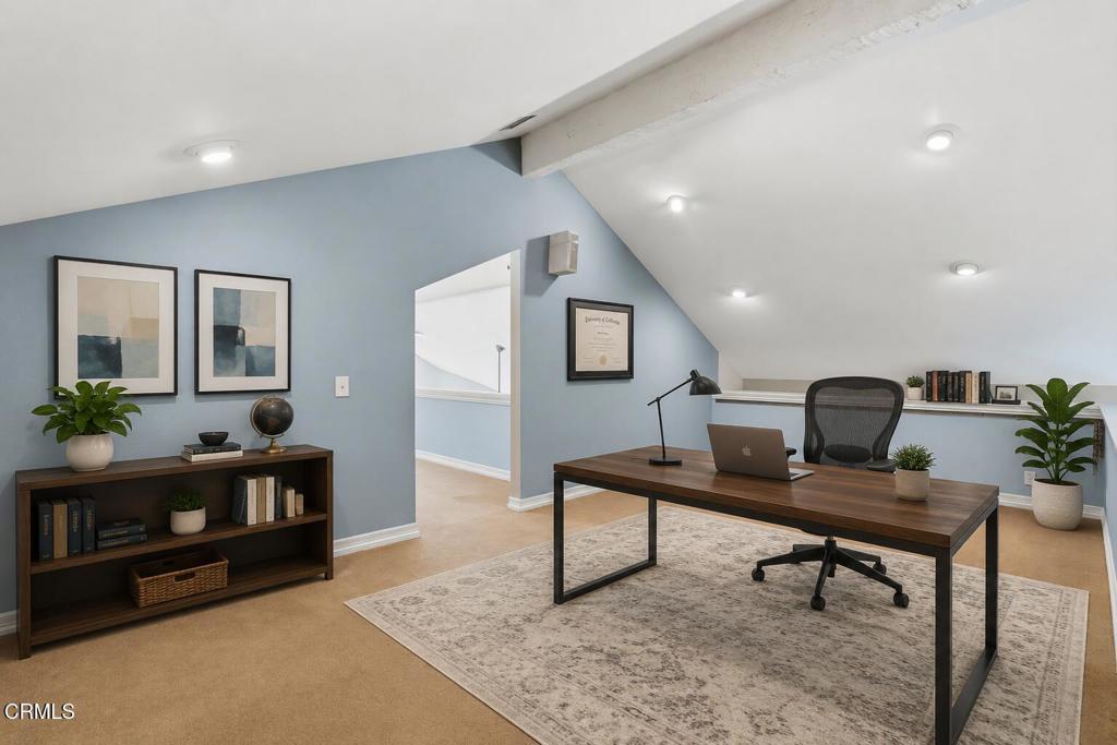 405 Woodcliffe Road Pasadena, CA 91105 - Photo 33 of 65 a living room with furniture and a rug