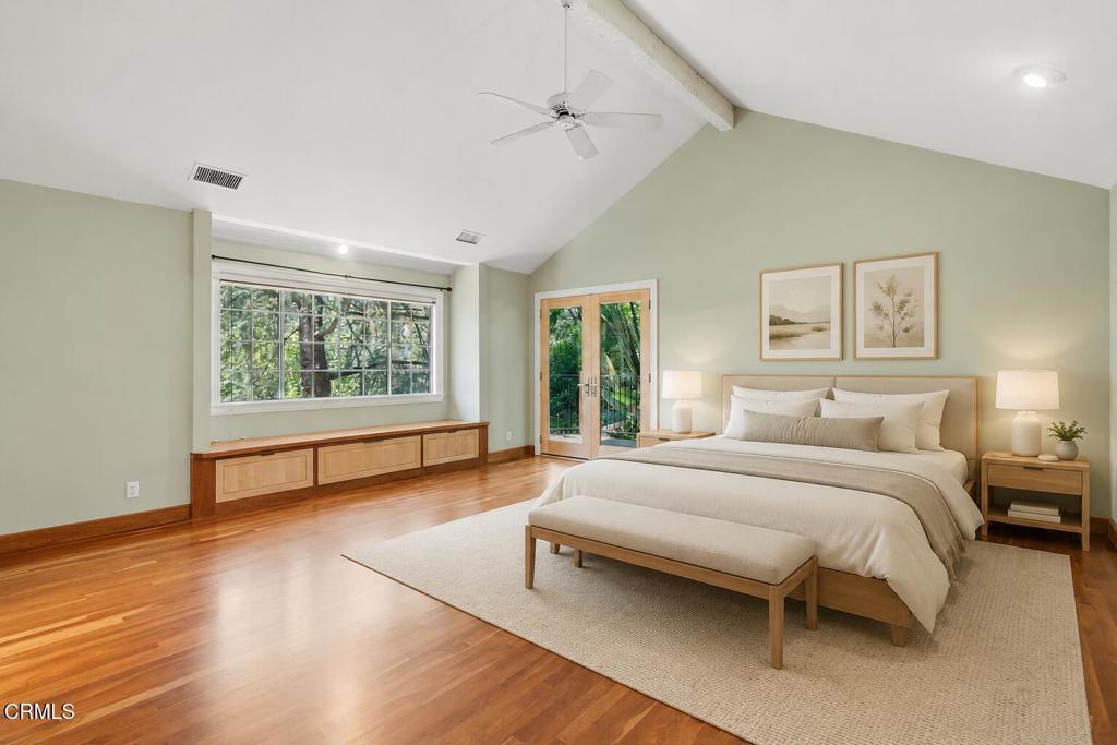 405 Woodcliffe Road Pasadena, CA 91105 - Photo 37 of 65 a bedroom with a large bed and a window