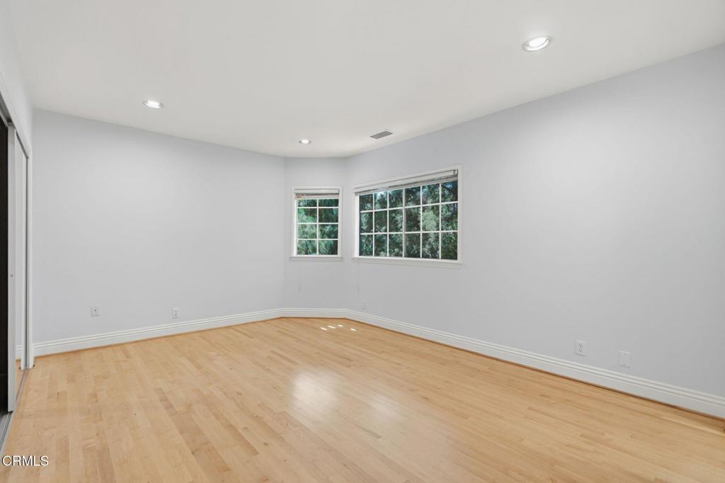 405 Woodcliffe Road Pasadena, CA 91105 - Photo 43 of 65 an empty room with windows