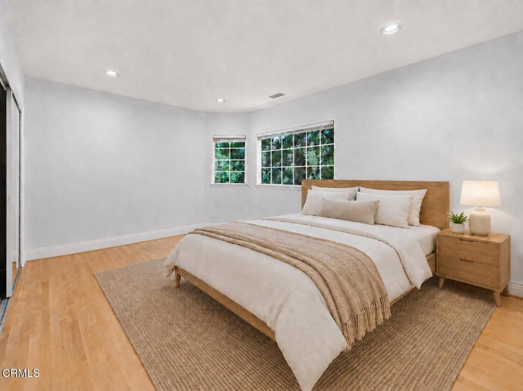 405 Woodcliffe Road Pasadena, CA 91105 - Photo 44 of 65 a bedroom with a bed and a window