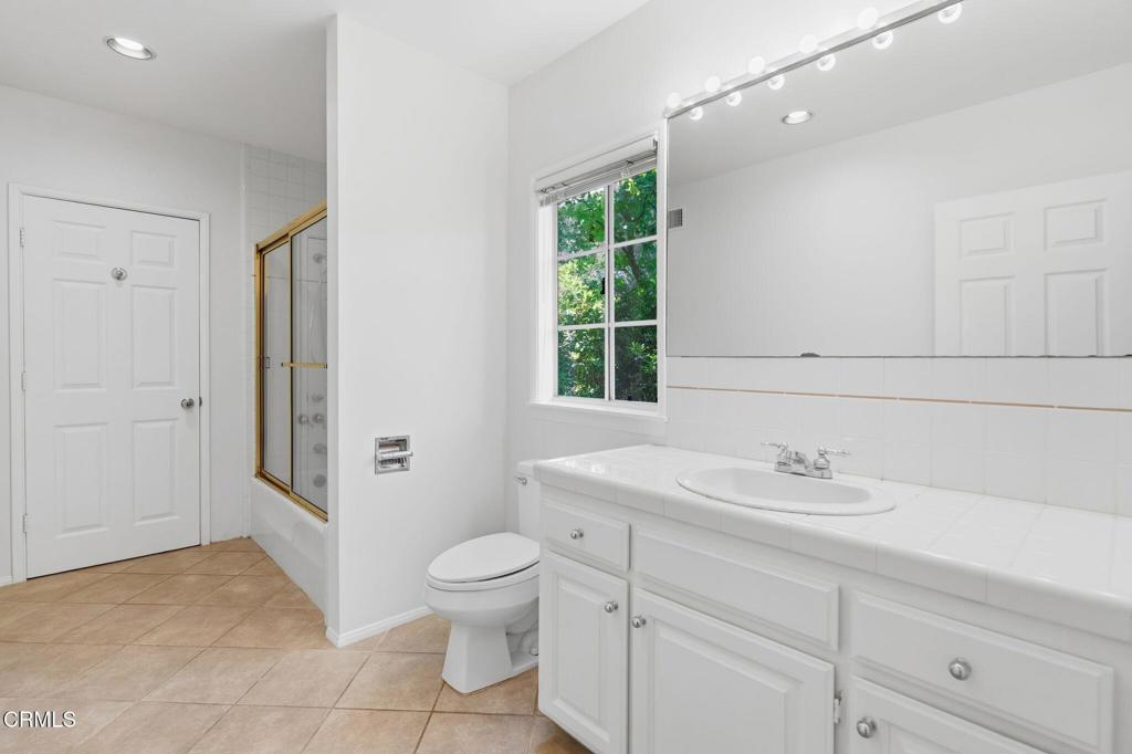 405 Woodcliffe Road Pasadena, CA 91105 - Photo 47 of 65 a bathroom with a sink toilet and shower