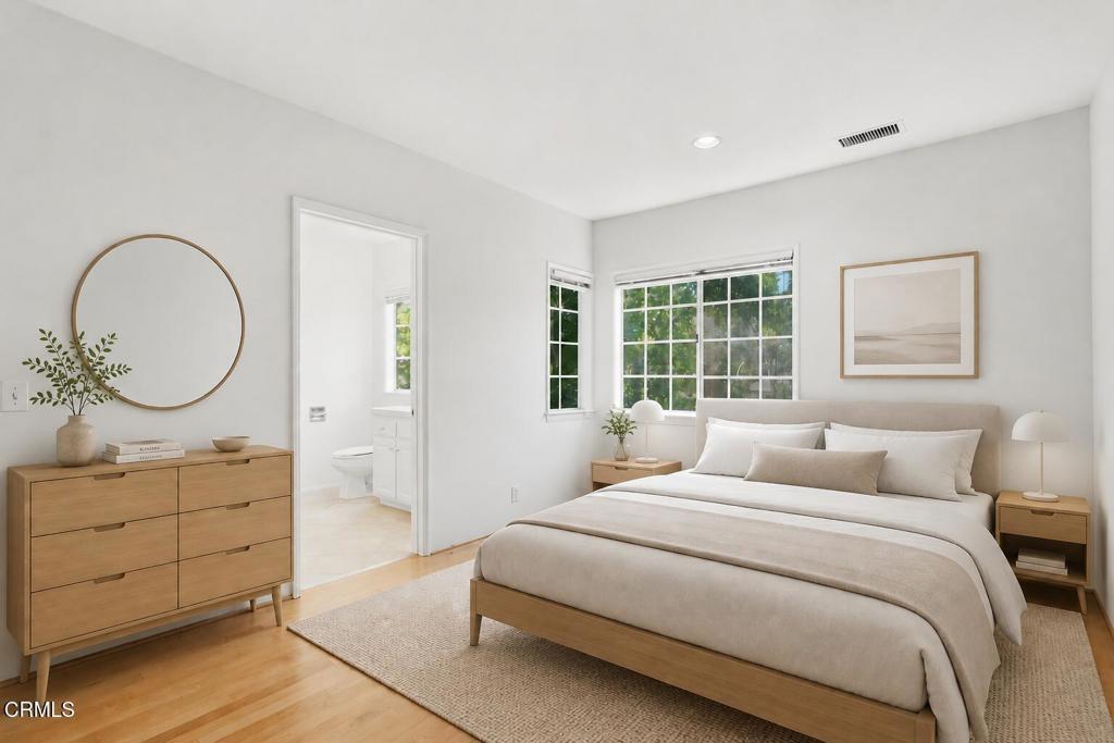 405 Woodcliffe Road Pasadena, CA 91105 - Photo 49 of 65 a bedroom with a large bed and a dresser