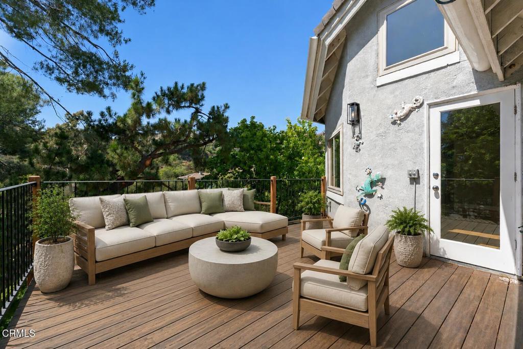 405 Woodcliffe Road Pasadena, CA 91105 - Photo 52 of 65 a view of a patio with couches and potted plants