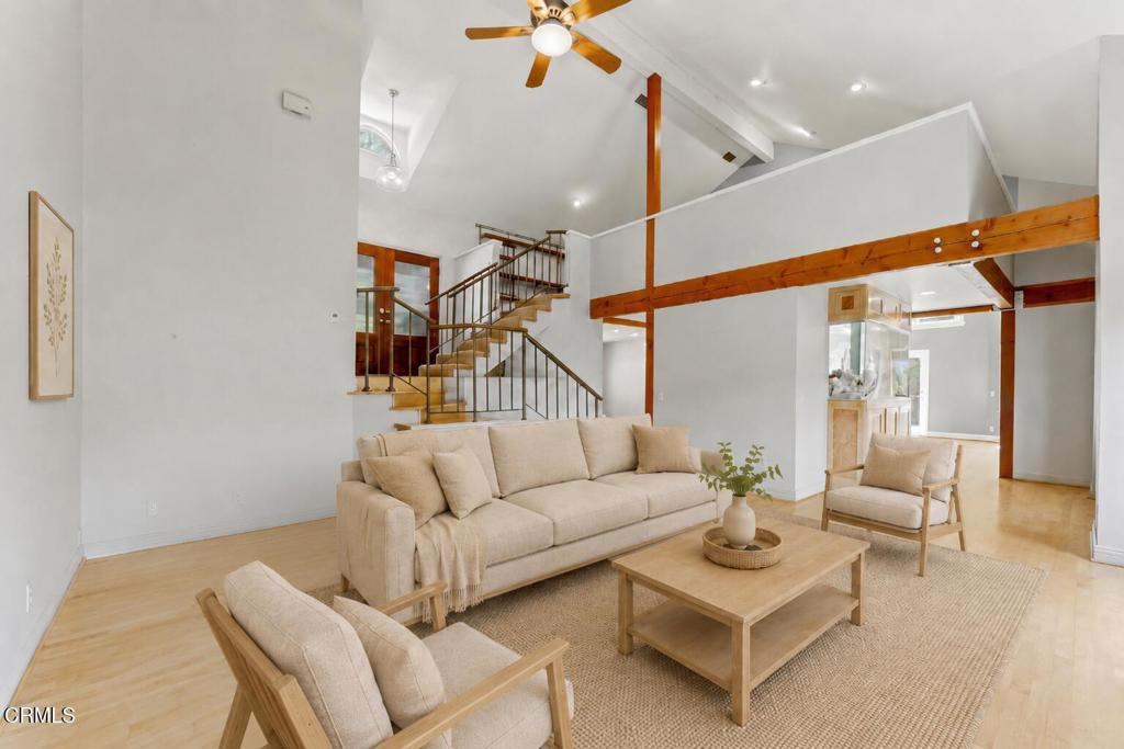 405 Woodcliffe Road Pasadena, CA 91105 - Photo 8 of 65 a living room with furniture and a ceiling fan