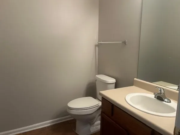 a bathroom with a sink and a toilet