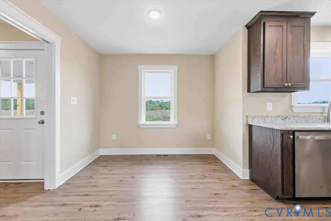 1588 Lansing Road Petersburg, VA 23805 - Photo 12 of 25 Unfurnished dining area with healthy amount of nat