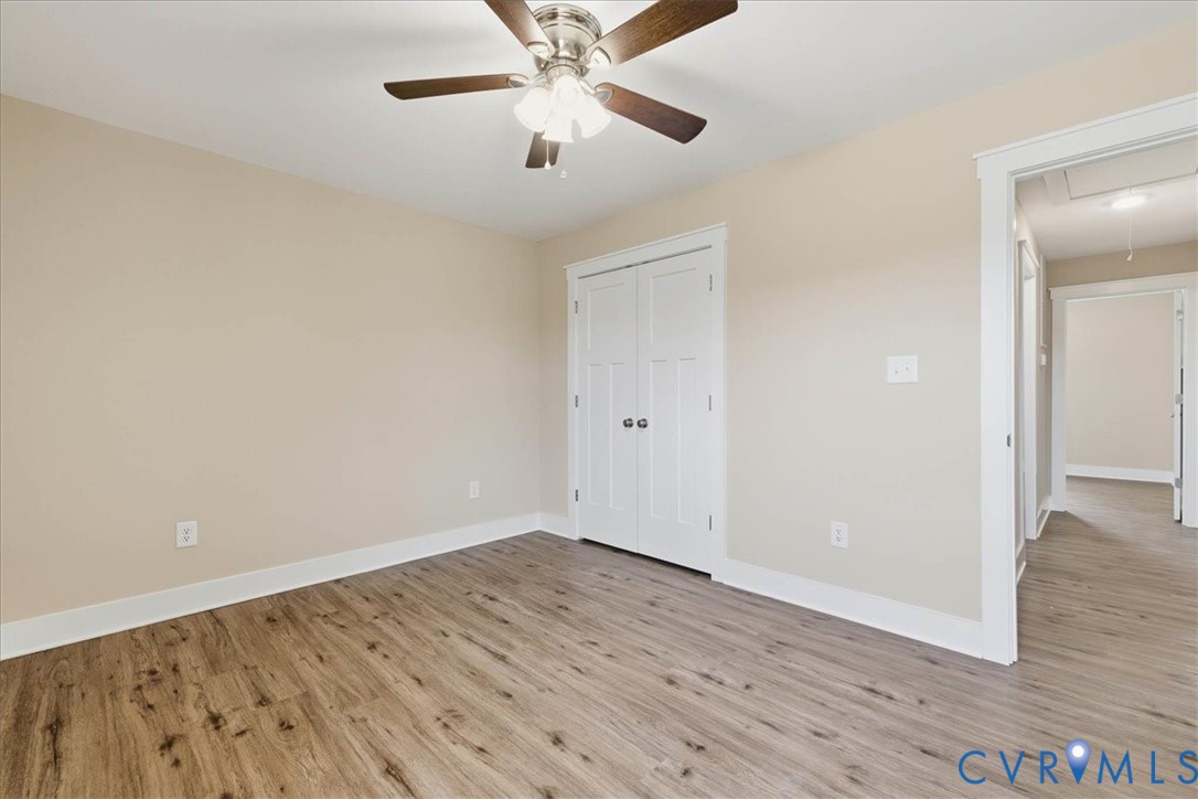 1588 Lansing Road Petersburg, VA 23805 - Photo 20 of 25 Unfurnished bedroom with attic access, light wood-