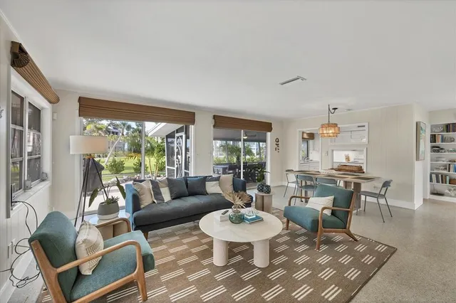 a kitchen with a sink a stove and cabinets
