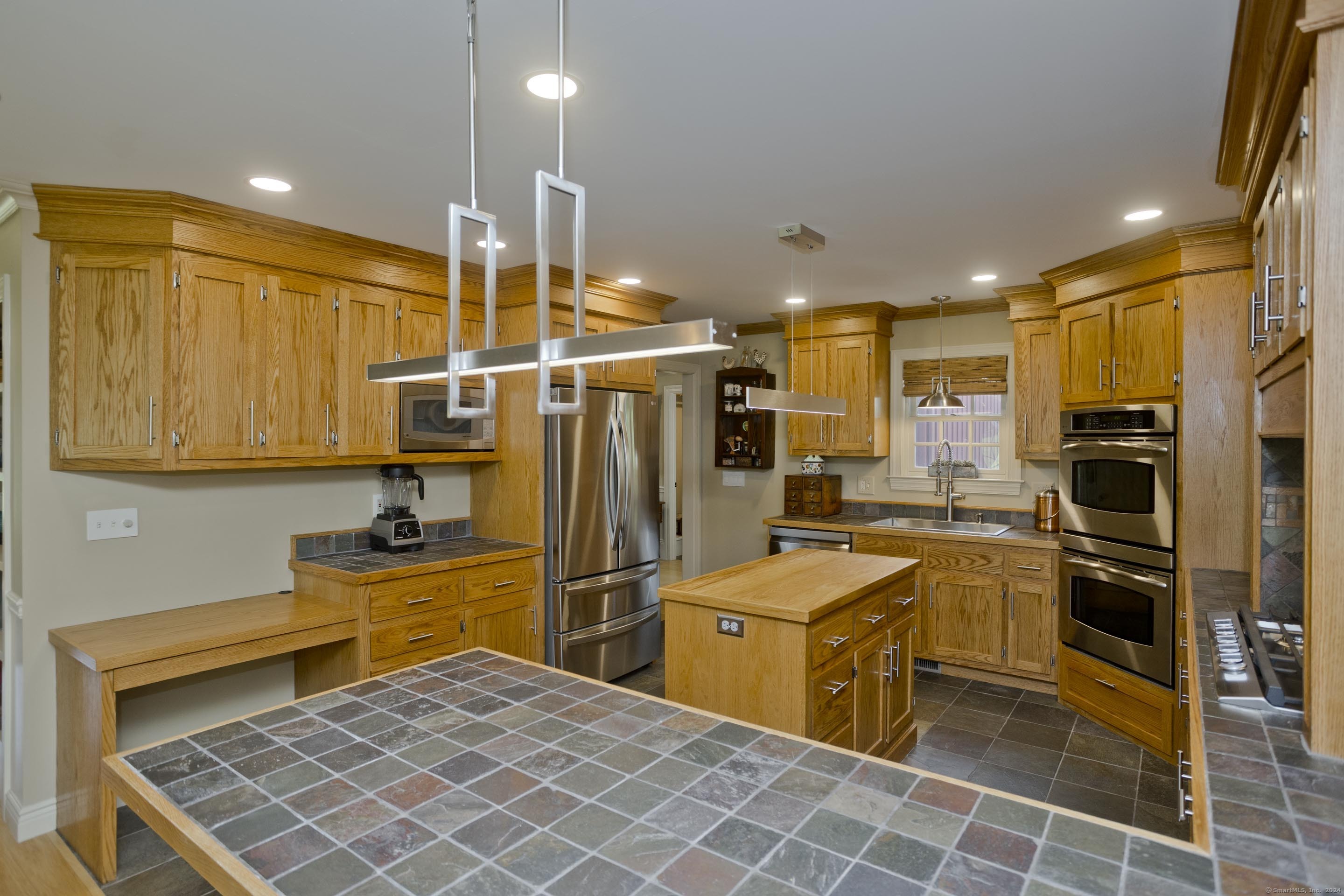 180 Leonard Road Stafford, CT 06076 - Photo 14 of 39 a kitchen with refrigerator and cabinets