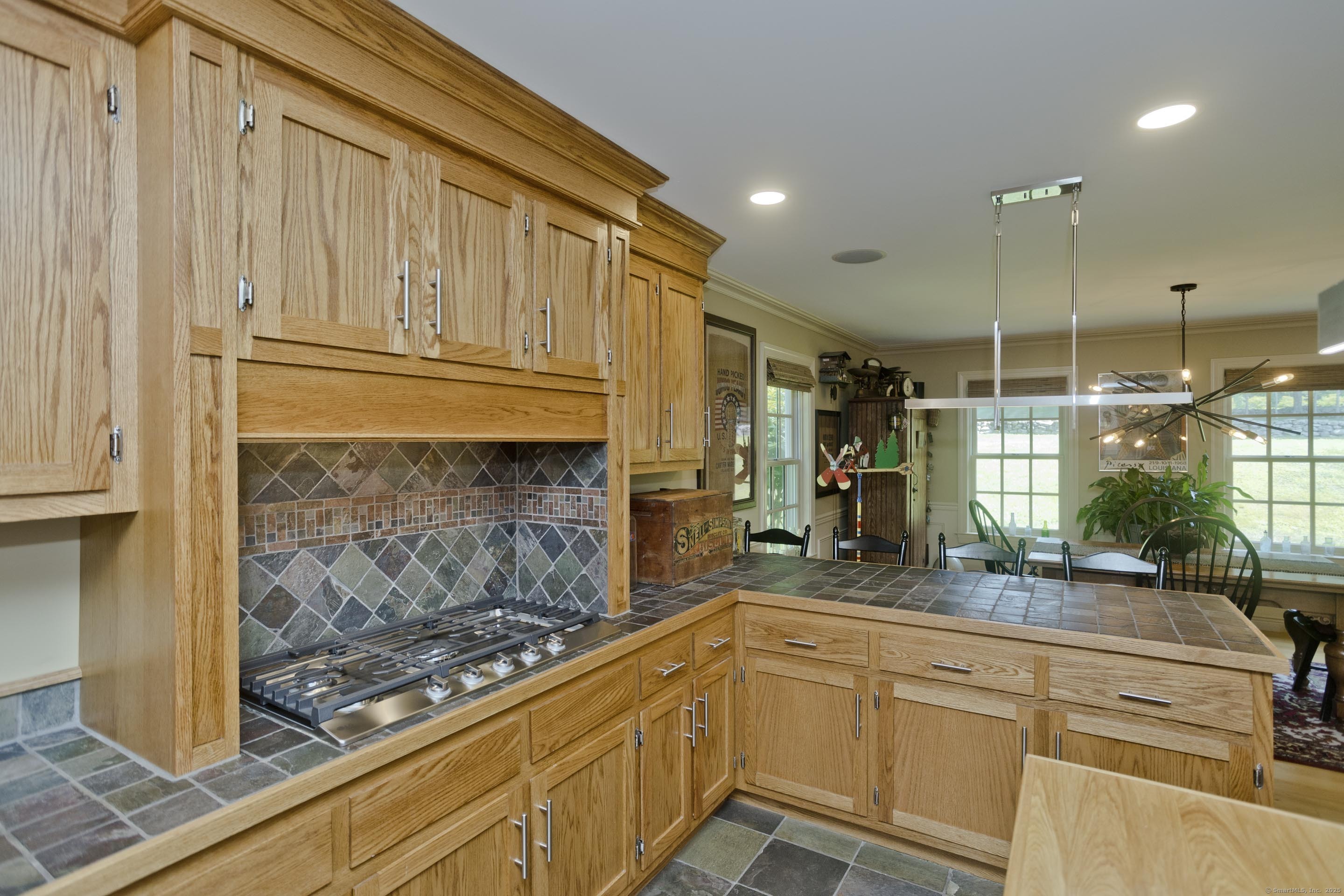 180 Leonard Road Stafford, CT 06076 - Photo 15 of 39 a kitchen with stainless steel appliances granite countertop a sink and cabinets