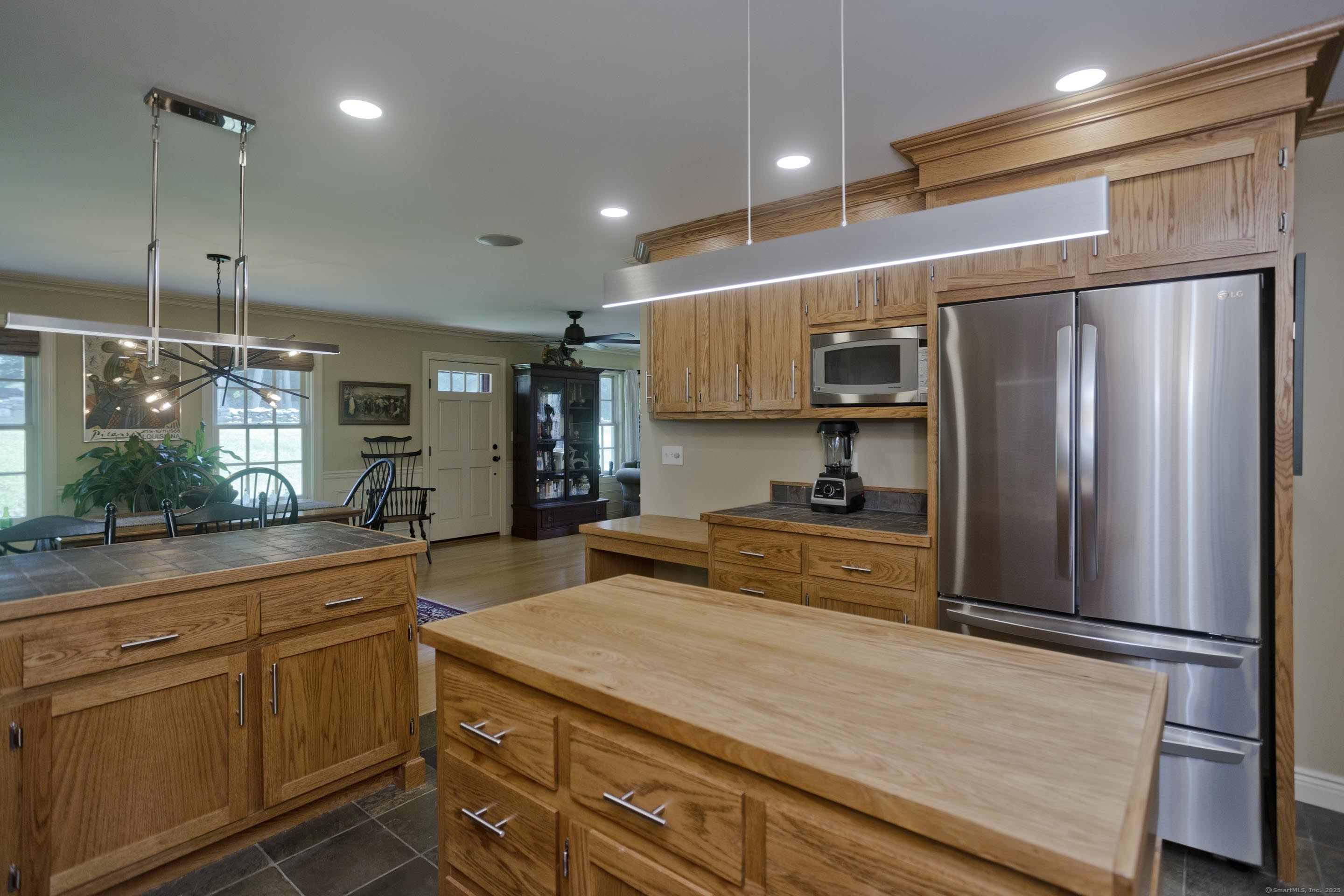 180 Leonard Road Stafford, CT 06076 - Photo 16 of 39 a kitchen with stainless steel appliances a refrigerator sink and stove