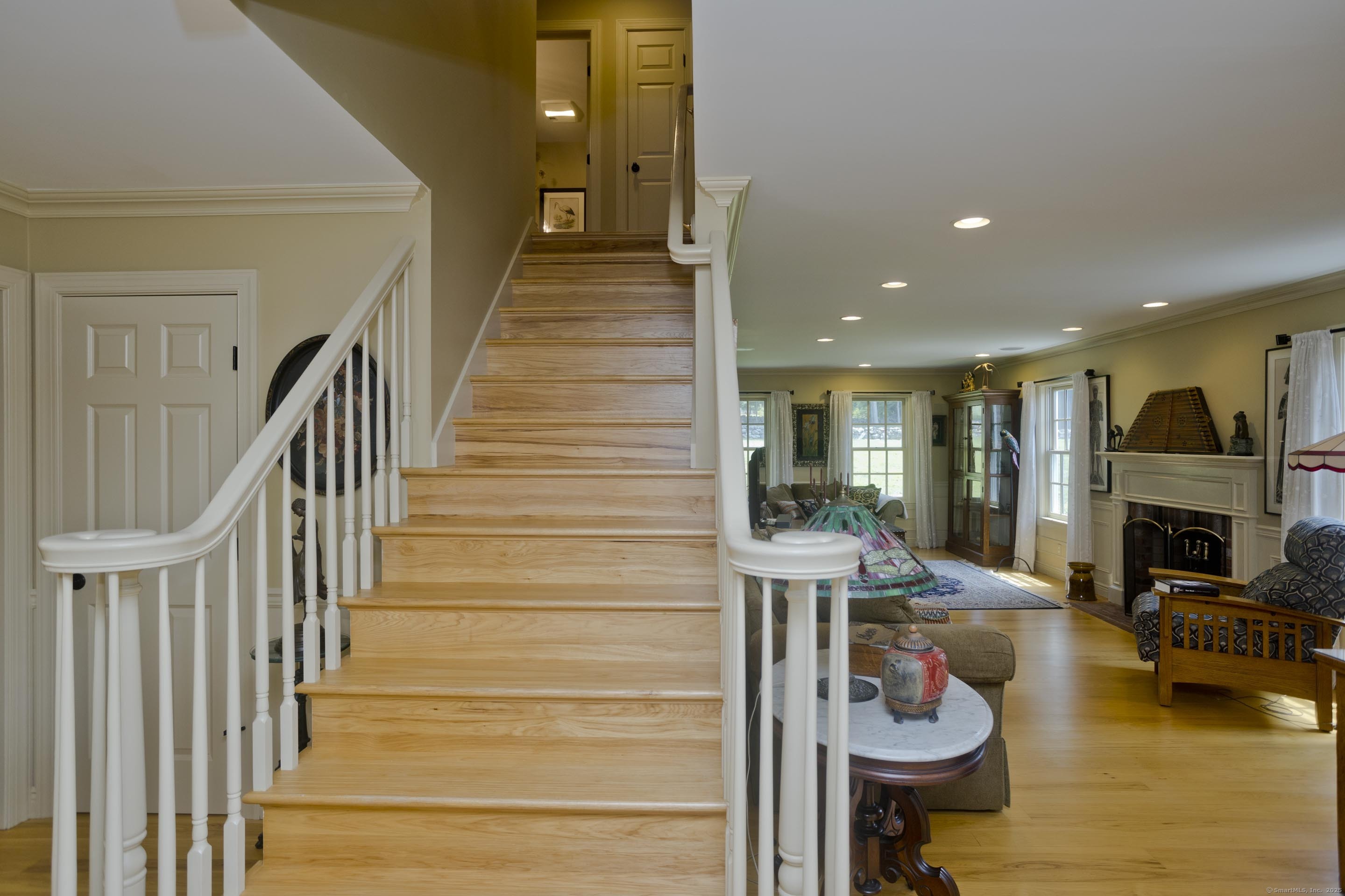180 Leonard Road Stafford, CT 06076 - Photo 21 of 39 a view of a livingroom with furniture fire place and kitchen view