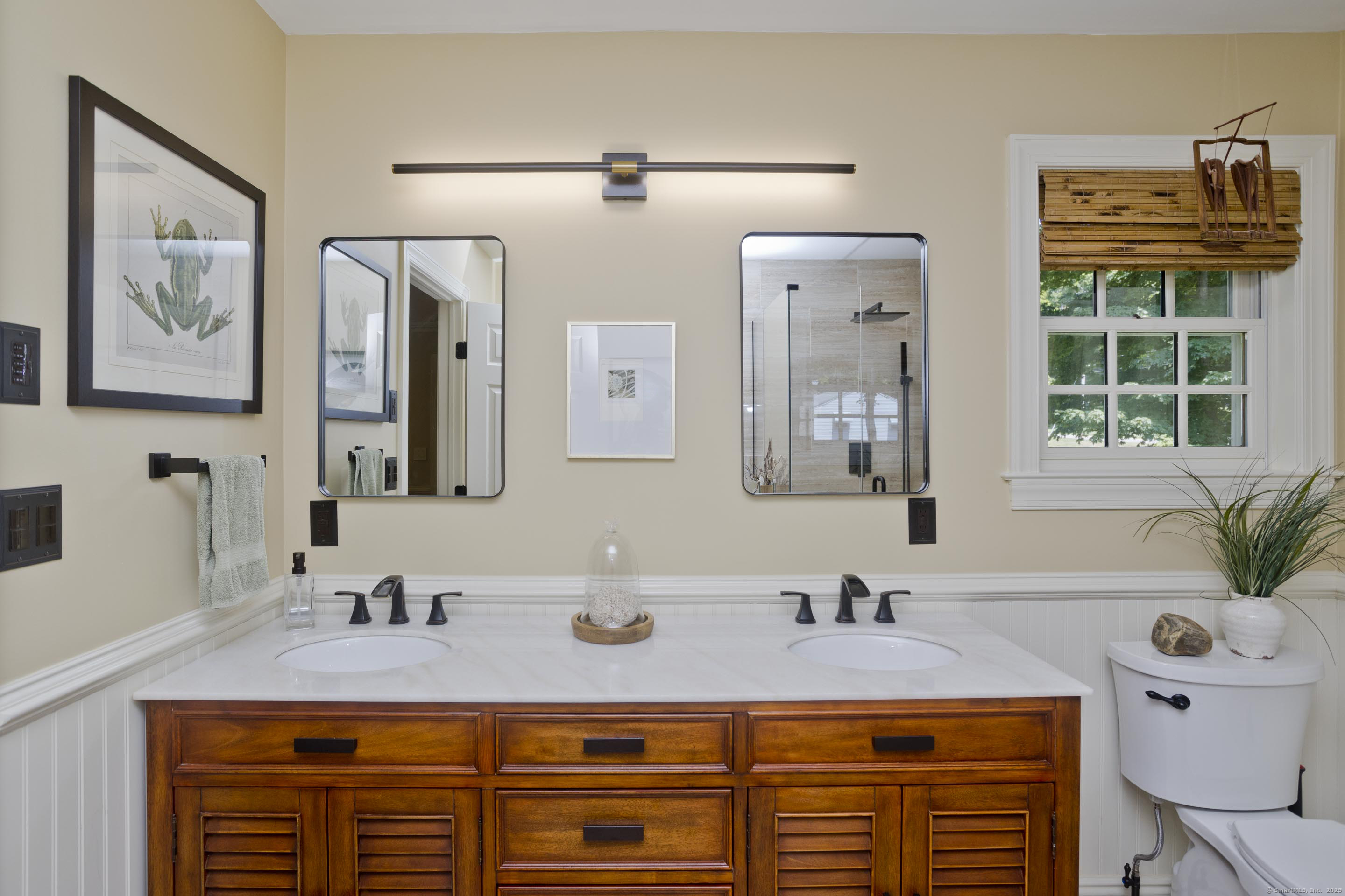 180 Leonard Road Stafford, CT 06076 - Photo 24 of 39 a bathroom with a sink double vanity and a mirror