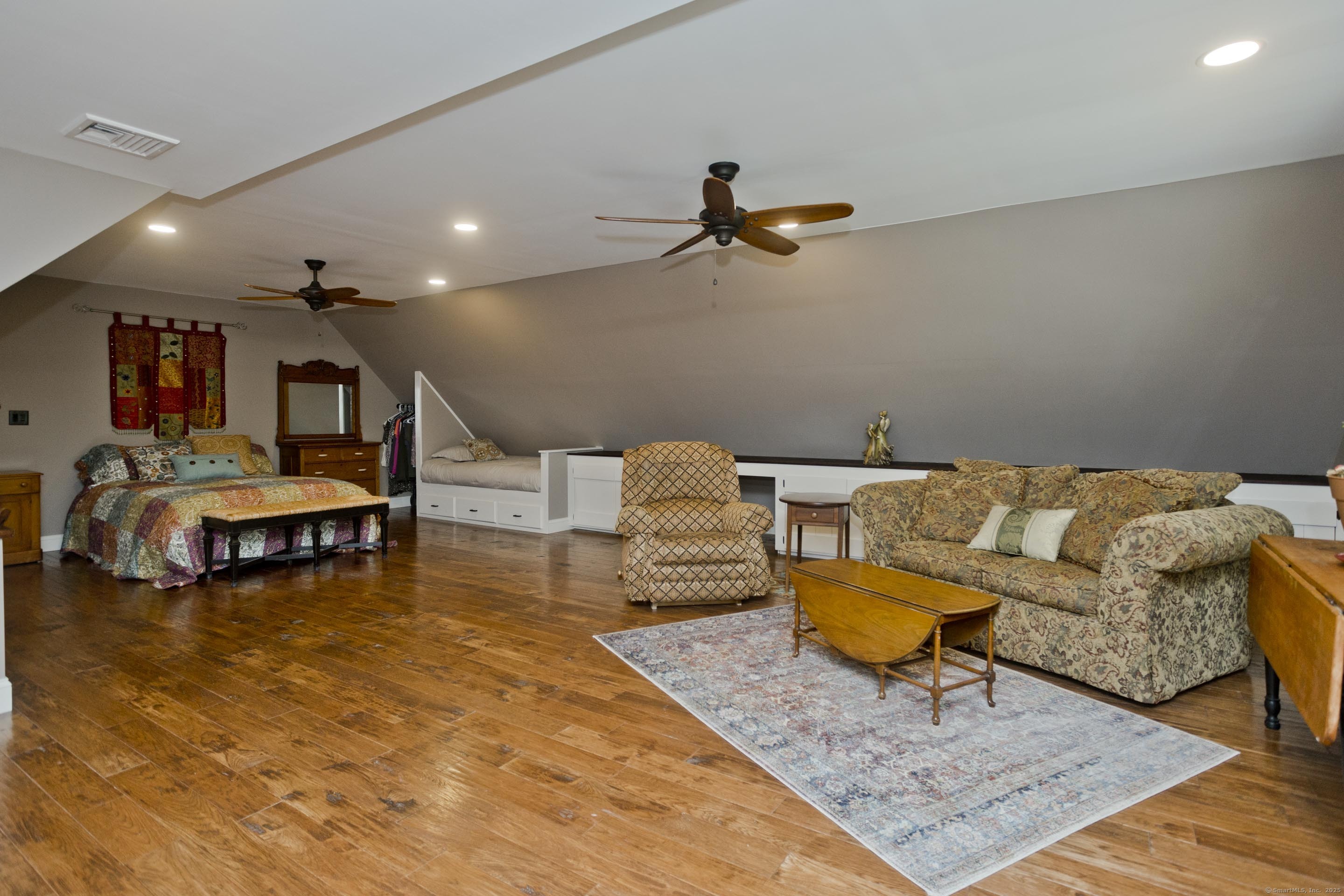 180 Leonard Road Stafford, CT 06076 - Photo 30 of 39 a living room with furniture and a rug