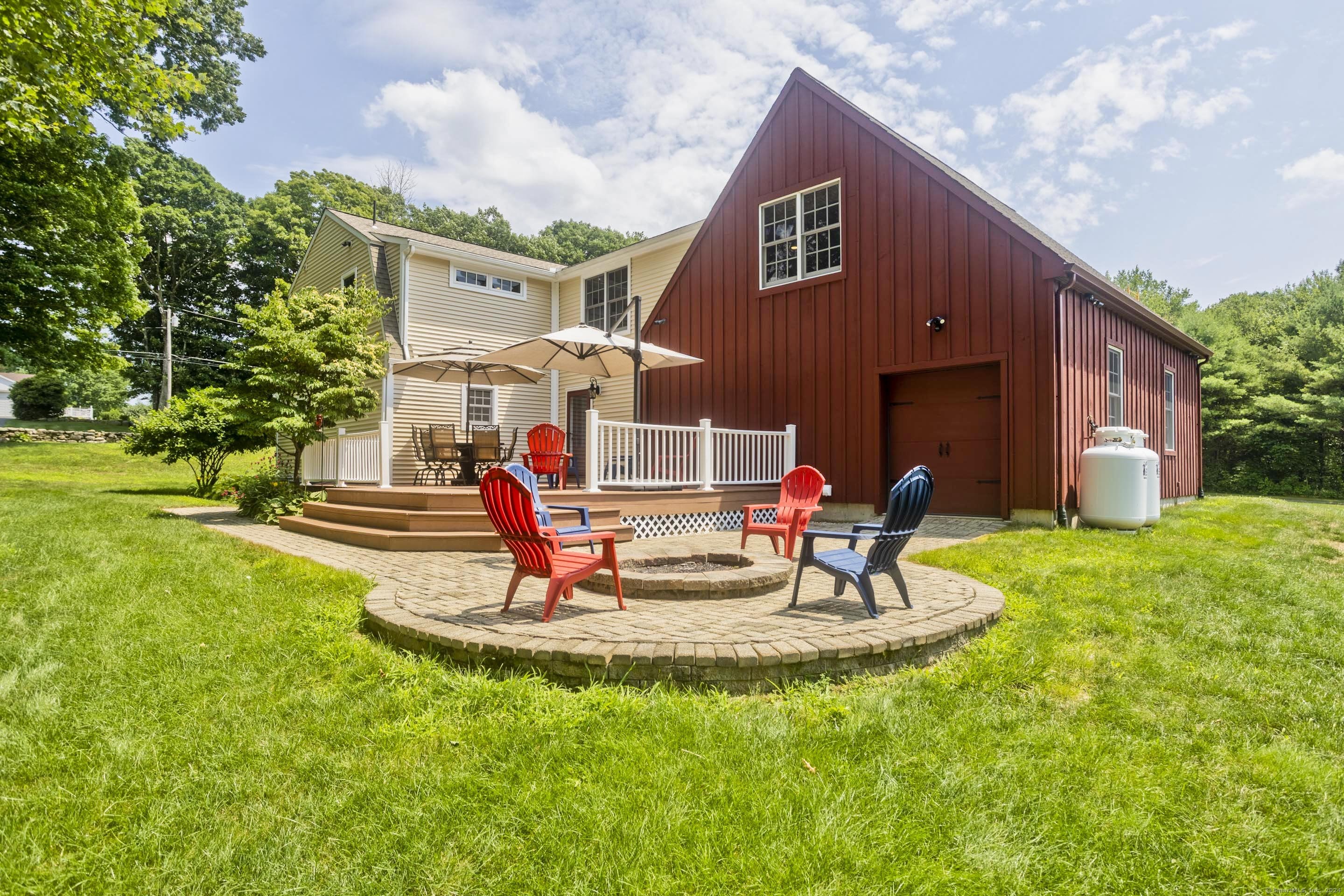 180 Leonard Road Stafford, CT 06076 - Photo 32 of 39 a house view with a garden space