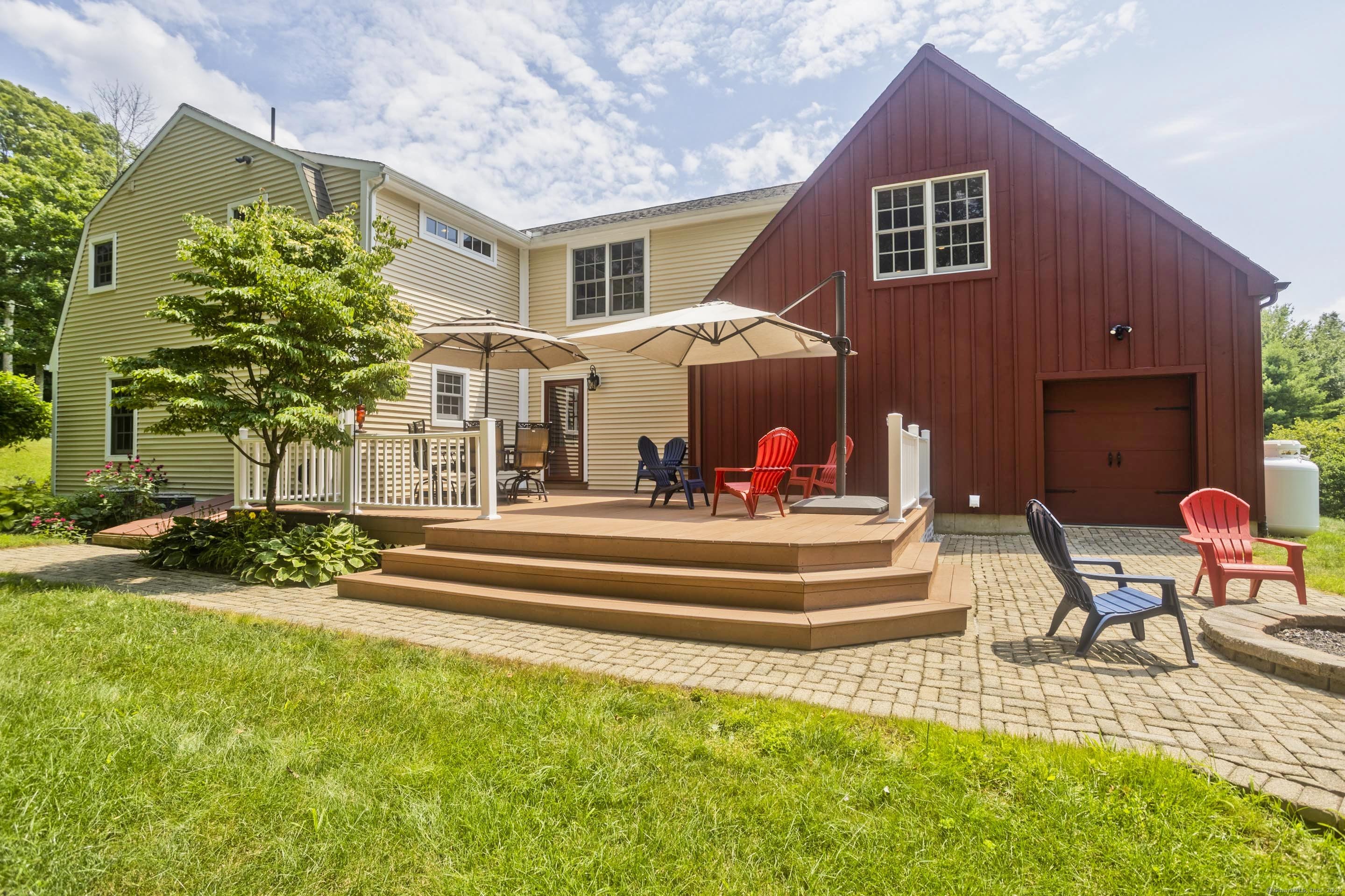 180 Leonard Road Stafford, CT 06076 - Photo 33 of 39 a front view of a house with a yard
