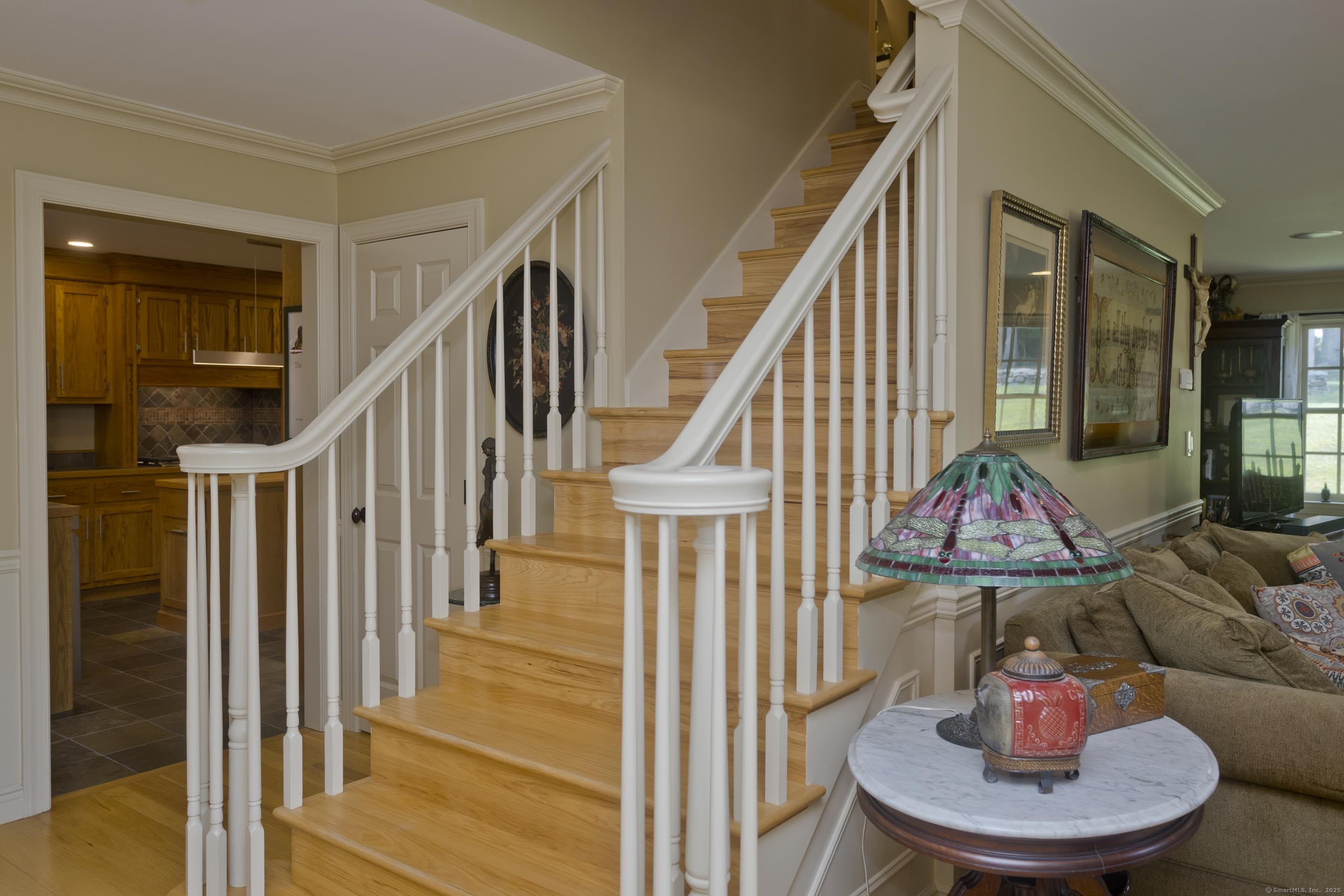 180 Leonard Road Stafford, CT 06076 - Photo 7 of 39 a view of a livingroom with furniture mirror and wooden floor
