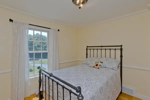 a bathroom with 2 sink and a mirror