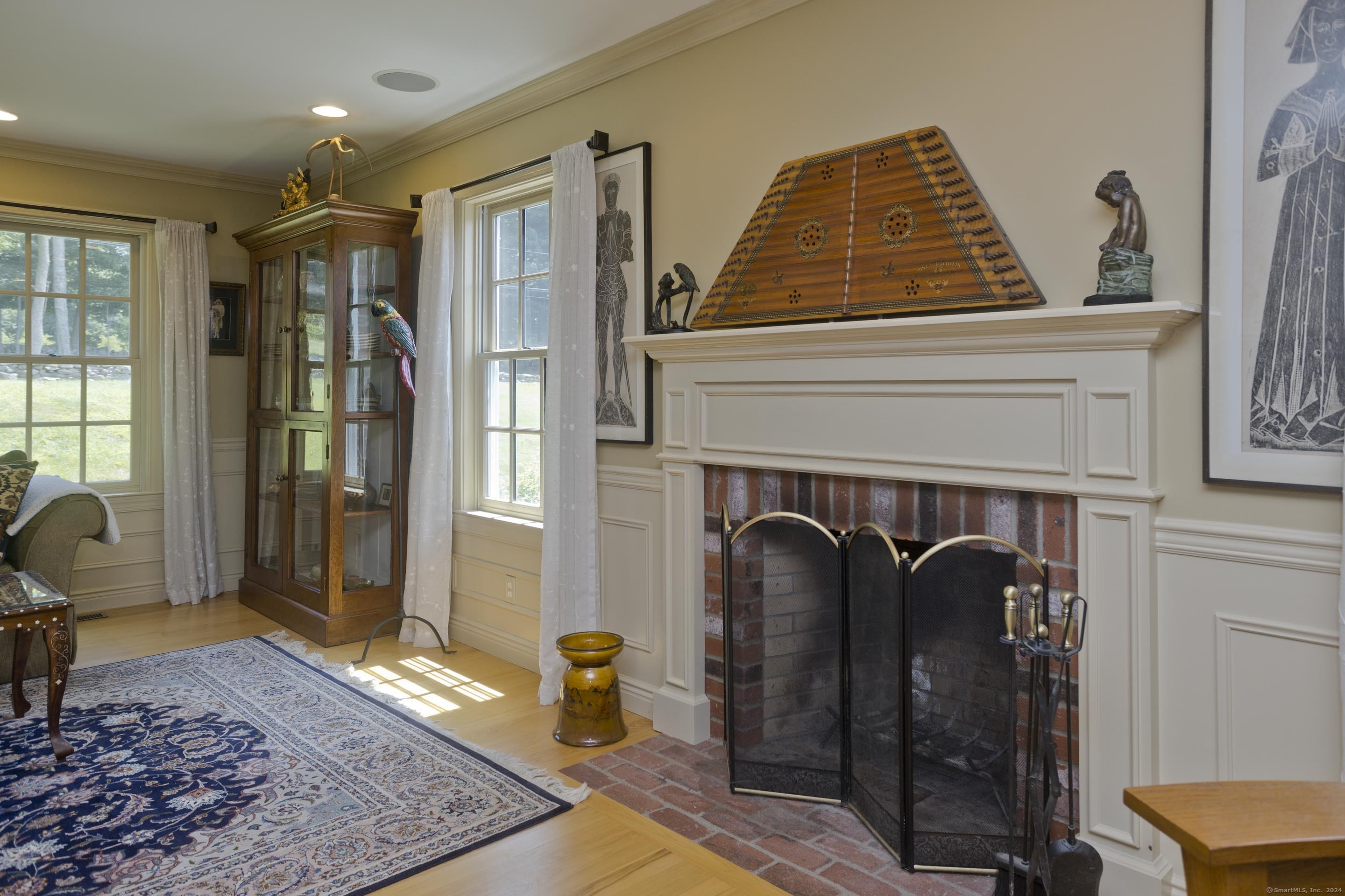 180 Leonard Road Stafford, CT 06076 - Photo 9 of 39 a living room with furniture and a fireplace