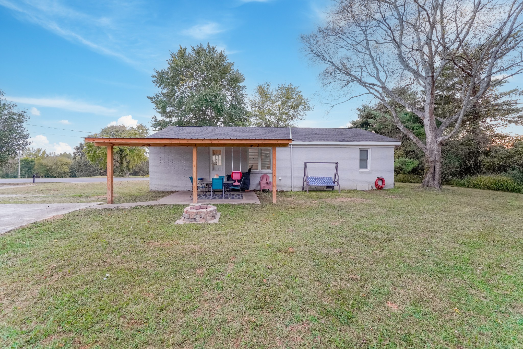 258 East Prospect Road Fayetteville, TN 37334 - Photo 7 of 26 a view of a house with backyard and garden